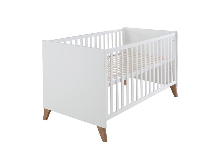 Lit bébé blanc avec pieds en bois