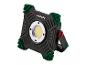 Projecteur de travail LED noir et vert avec lumière jaune et bouton rouge.