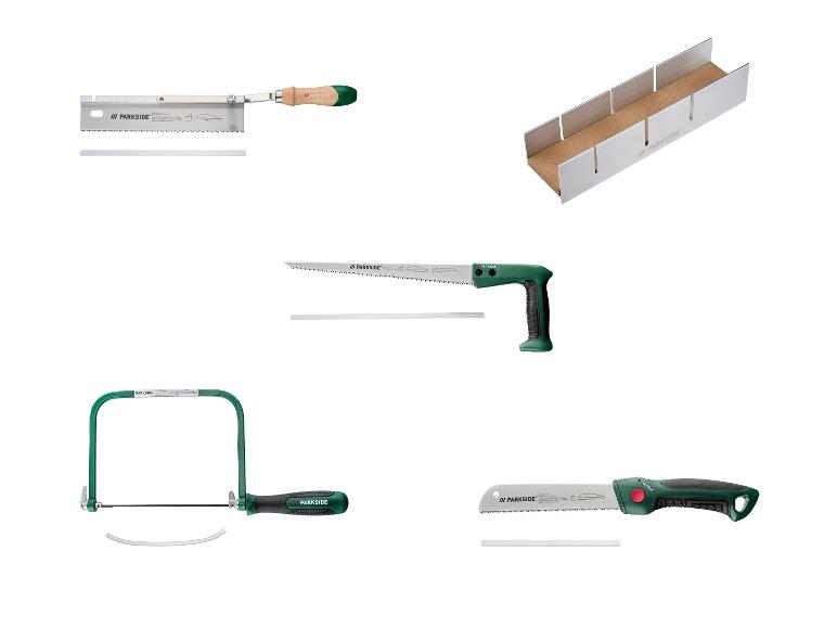 Un ensemble de scies à main et une boîte à onglets pour couper le bois.