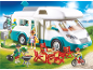 Camping-car jouet pour enfants avec figurines et accessoires de camping.