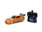 Voiture télécommandée orange Fast & Furious avec manette noire.