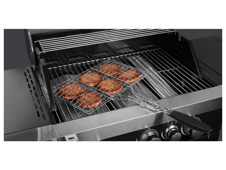 Hamburgers grillées sur une grille avec une poignée.