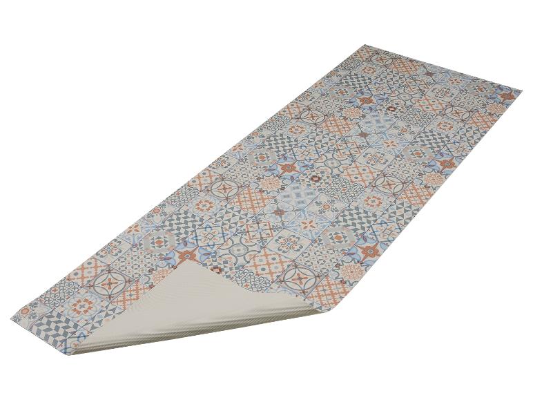 Tapis en vinyle avec motif de carreaux hydrauliques dans les tons bleu, gris et orange.