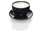 Une tasse de café avec de la mousse de lait dans une tasse noire.