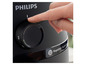 Une main ajuste la température d'une friteuse à air Philips avec la technologie RapidAir.
