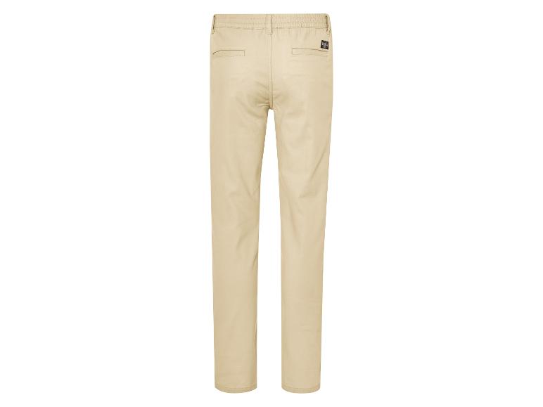 Pantalon beige clair pour homme.