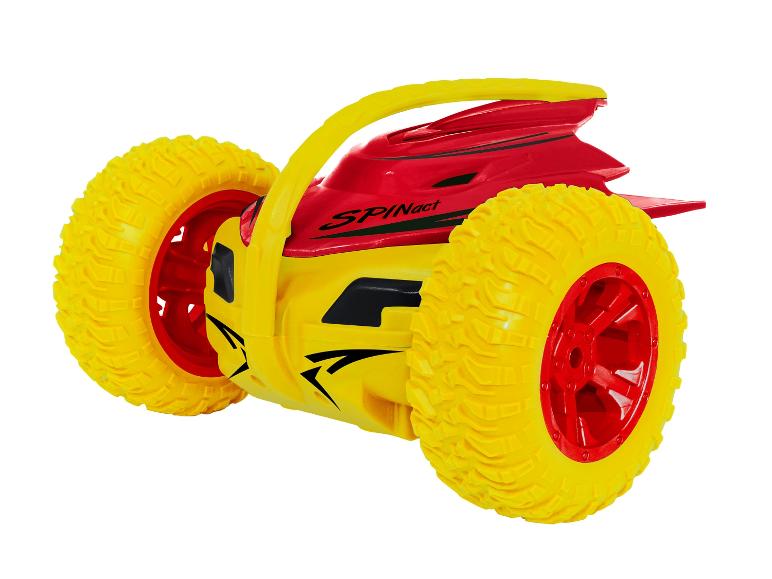 Une voiture de cascade Spinact jaune et rouge avec de grandes roues.