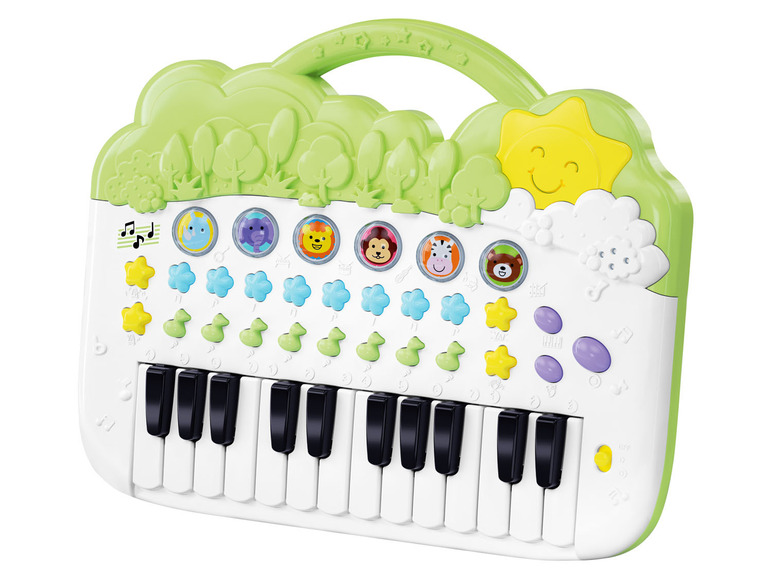Un piano pour enfant vert avec des motifs d'animaux.