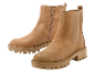 Bottines Chelsea couleur beige clair à talon plat.