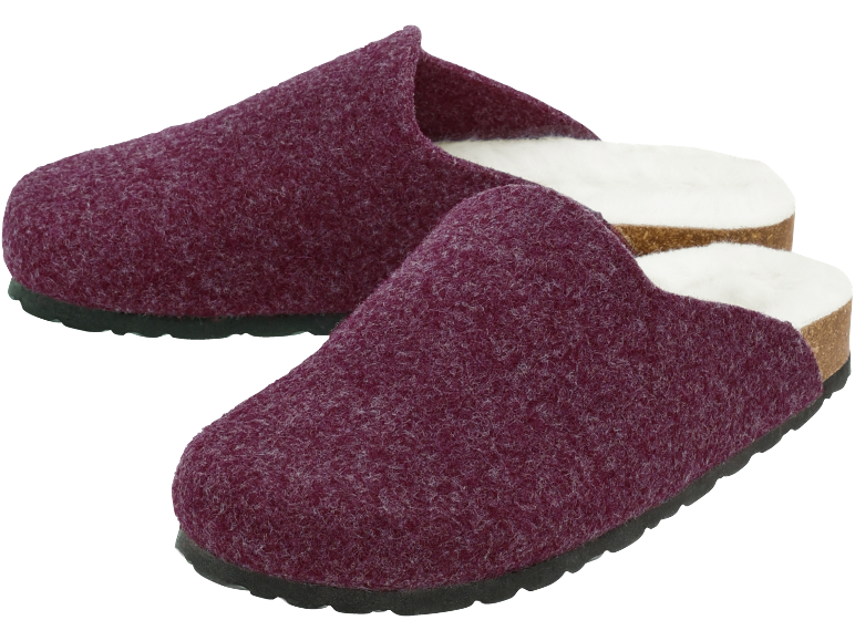 Paire de chaussons violets en feutre avec semelle intérieure blanche et semelle extérieure noire.
