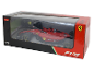 Voiture de course télécommandée Formule 1 rouge dans son emballage d'origine.