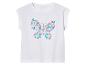 T-shirt blanc avec un imprimé de papillon à fleurs.