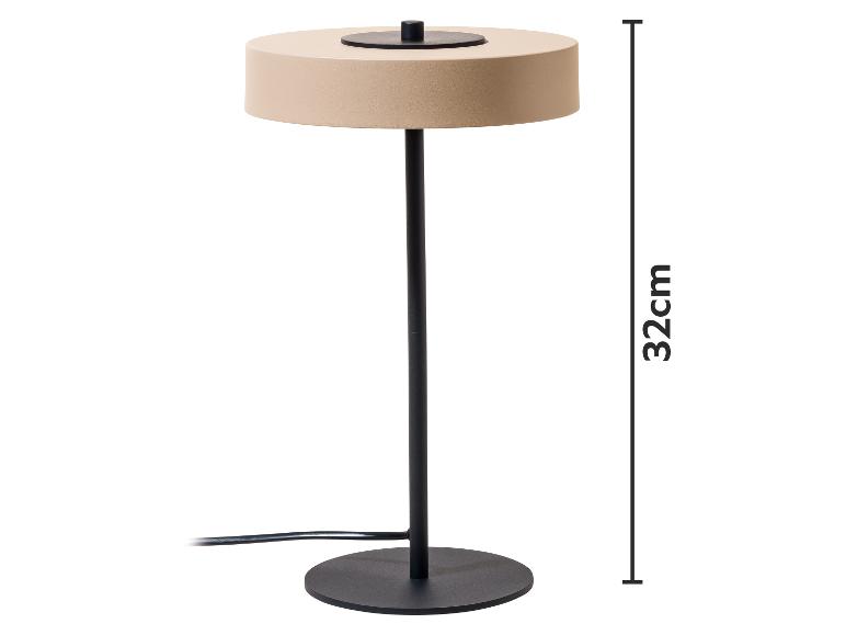 Lampe de table beige avec pied et base noirs, de 32 cm de haut.