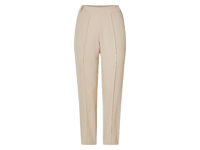 Pantalon beige taille haute.