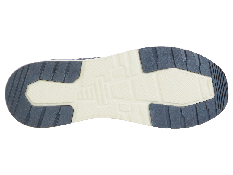 Semelle de baskets avec une bande de roulement texturée.