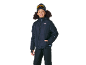 Enfant souriant portant une veste de ski matelassée noire, un pantalon de ski et un bonnet avec des lunettes.
