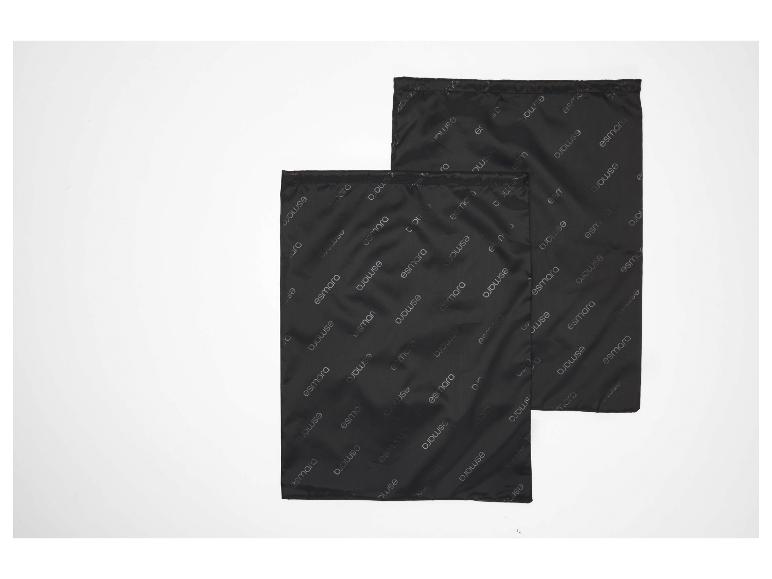 Deux sacs à linge noirs Esmara avec motif de logo répété.