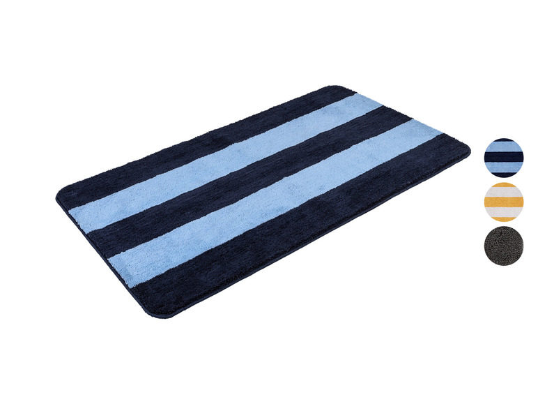 Un tapis de bain à rayures bleues et marine