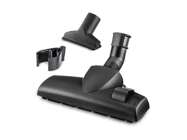 Ensemble d'accessoires d'aspirateur noirs avec brosse à plancher, suceur plat et support.