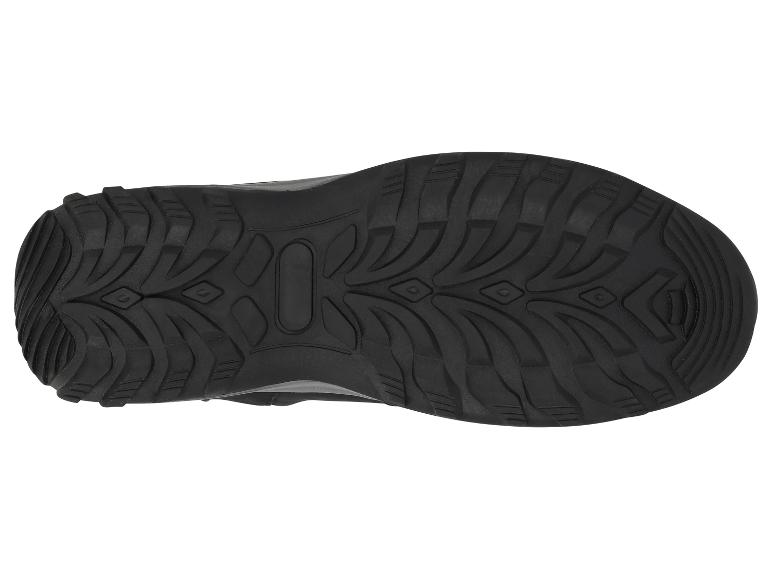 Semelle de chaussure de randonnée noire avec un motif de bande de roulement robuste.