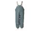 Pantalon de pluie vert pour enfants avec bretelles et détails réfléchissants.