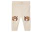 Leggings bébé beige avec applications d'ours.