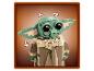 Une figurine LEGO Grogu (L'Enfant) avec des oreilles et une tête articulées.