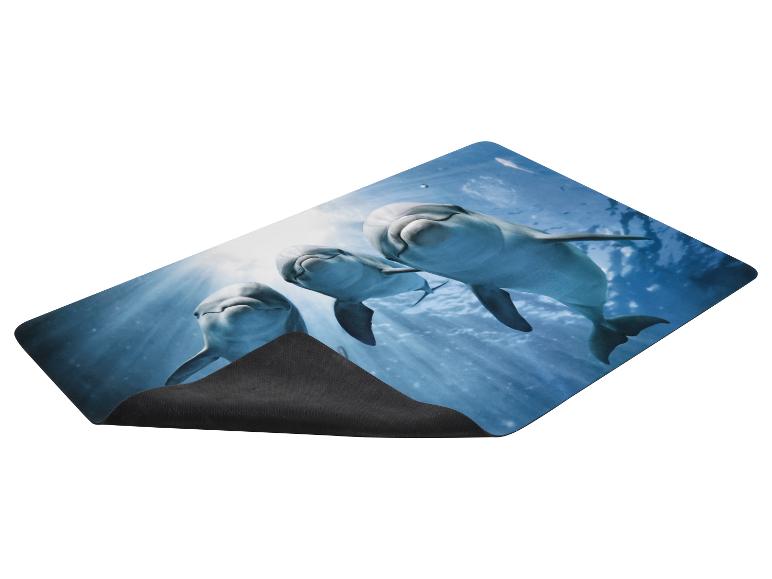 Tapis de souris avec trois dauphins nageant sous l'eau avec des rayons de soleil d'en haut