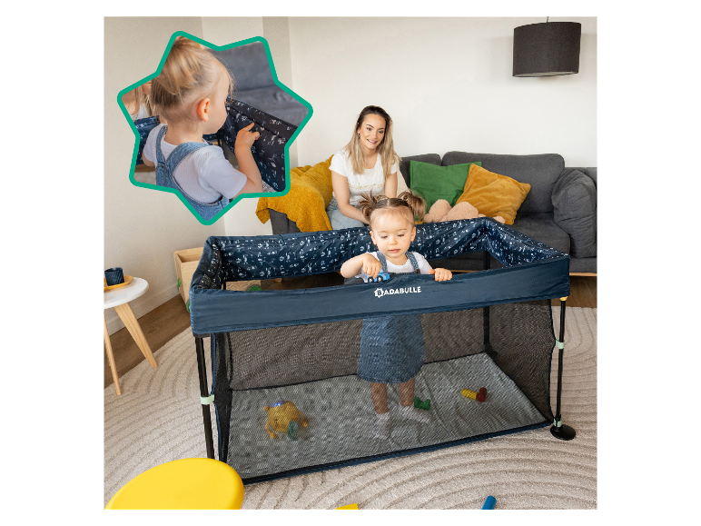 Parc bébé Badabulle avec un jeune enfant jouant à l'intérieur.