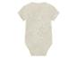 Body bébé beige en mousseline.
