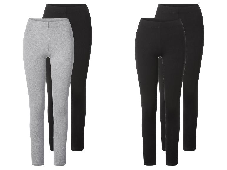 Deux paires de leggings : une grise et une noire, plus deux paires de leggings noirs.