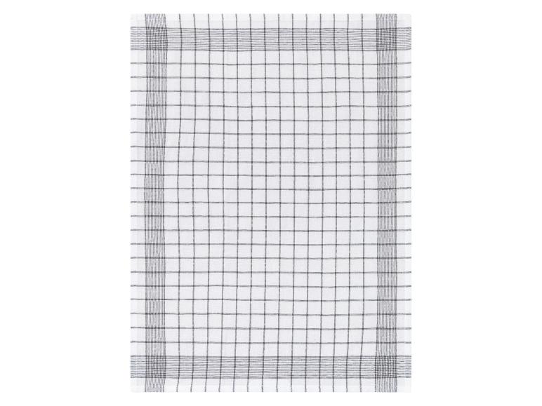 Un torchon blanc avec une bordure à carreaux noir et blanc.