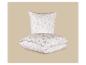 Parure de lit blanche avec motif floral beige.