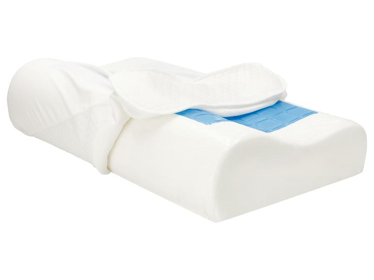 Oreiller en mousse à mémoire de forme blanc avec gel rafraîchissant bleu, partiellement recouvert d'une taie.