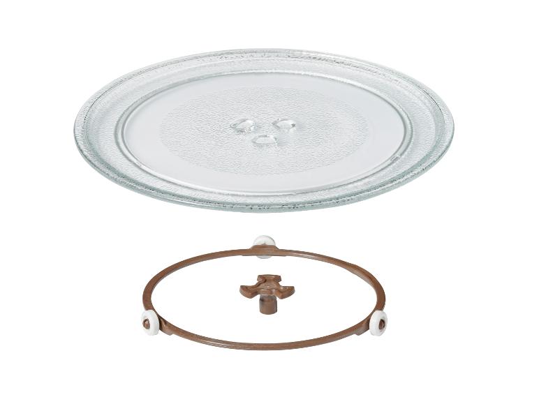 Plateau tournant en verre pour micro-ondes avec anneau à roulettes marron et coupleur.