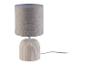 Lampe de table beige avec abat-jour en tissu et base en céramique.