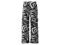 Pantalon large à imprimé abstrait noir et blanc.