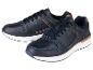 Chaussures de sport pour hommes, bleu marine, semelle blanche.