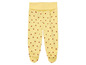 Pantalon jaune pour bébé avec un motif de fraises.