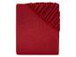 Un drap housse rouge avec élastique.