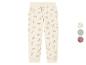 Pantalon de jogging blanc à motif arc-en-ciel.