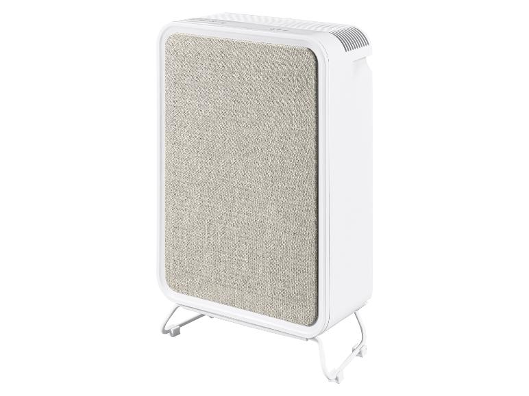 Purificateur d'air blanc avec façade en tissu et support.