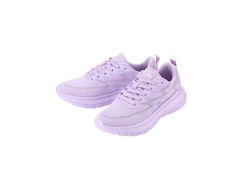 Paire de chaussures de sport violettes avec lacets et semelle épaisse