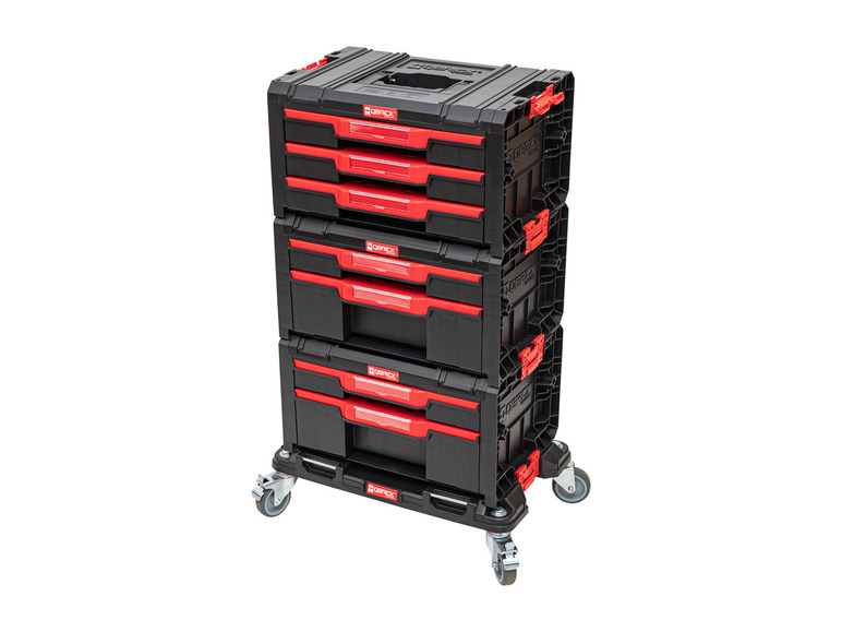 Une boîte à outils noire avec des tiroirs rouges et des roulettes de Qbrick System.
