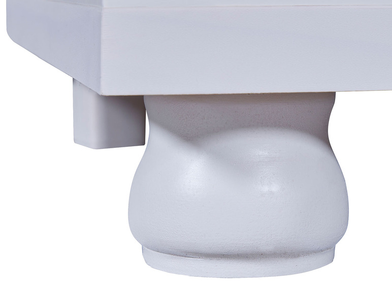 Socle en bois blanc avec des pieds tournés.