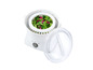 Une centrifugeuse à salade blanche avec de la salade, un couvercle transparent et la marque SilverCrest.