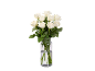 Bouquet de roses blanches dans un vase en verre avec de l'eau.