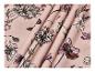 Tissu rose à motifs floraux et papillons