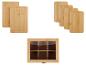 Deux planches à découper en bambou, quatre plus petites planches à découper en bambou et une boîte à thé en bois avec un couvercle en verre.