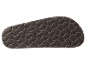 Semelle de sandale brun foncé avec motif en relief.